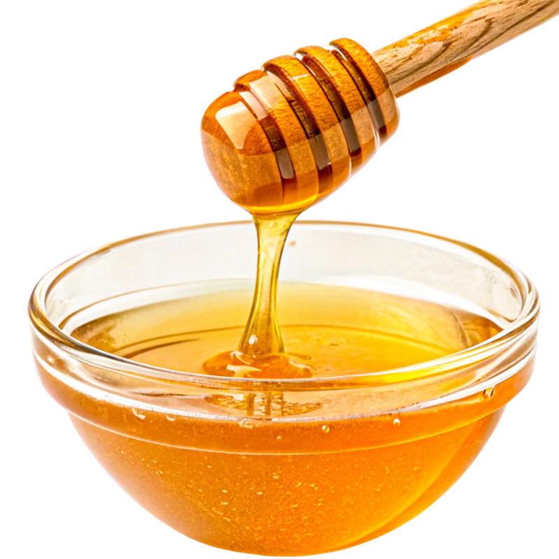 Golden honey with a wooden honey dipper — Ayurvedic humectant in the Rose & Ashwagandha body cream